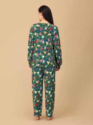 Back pose by Pregnant model wearing Merry Snuggle Squad Maternity Pajama Set from the mom store