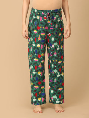 Close up of trousers of Pregnant model wearing Merry Snuggle Squad Maternity Pajama Set from the mom store from the front