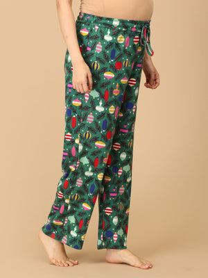 Close up of trousers of Pregnant model wearing Merry Snuggle Squad Maternity Pajama Set from the mom store