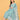 Model seated wearing MintSaheli Maternity and Nursing Kurta Set With Dupatta in mint green floral print with matching dupatta.
