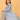 Modern Loom Maternity and Nursing Shacket Dress mid-length portrait showing lapel collar shacket and striped maternity dress underneath.