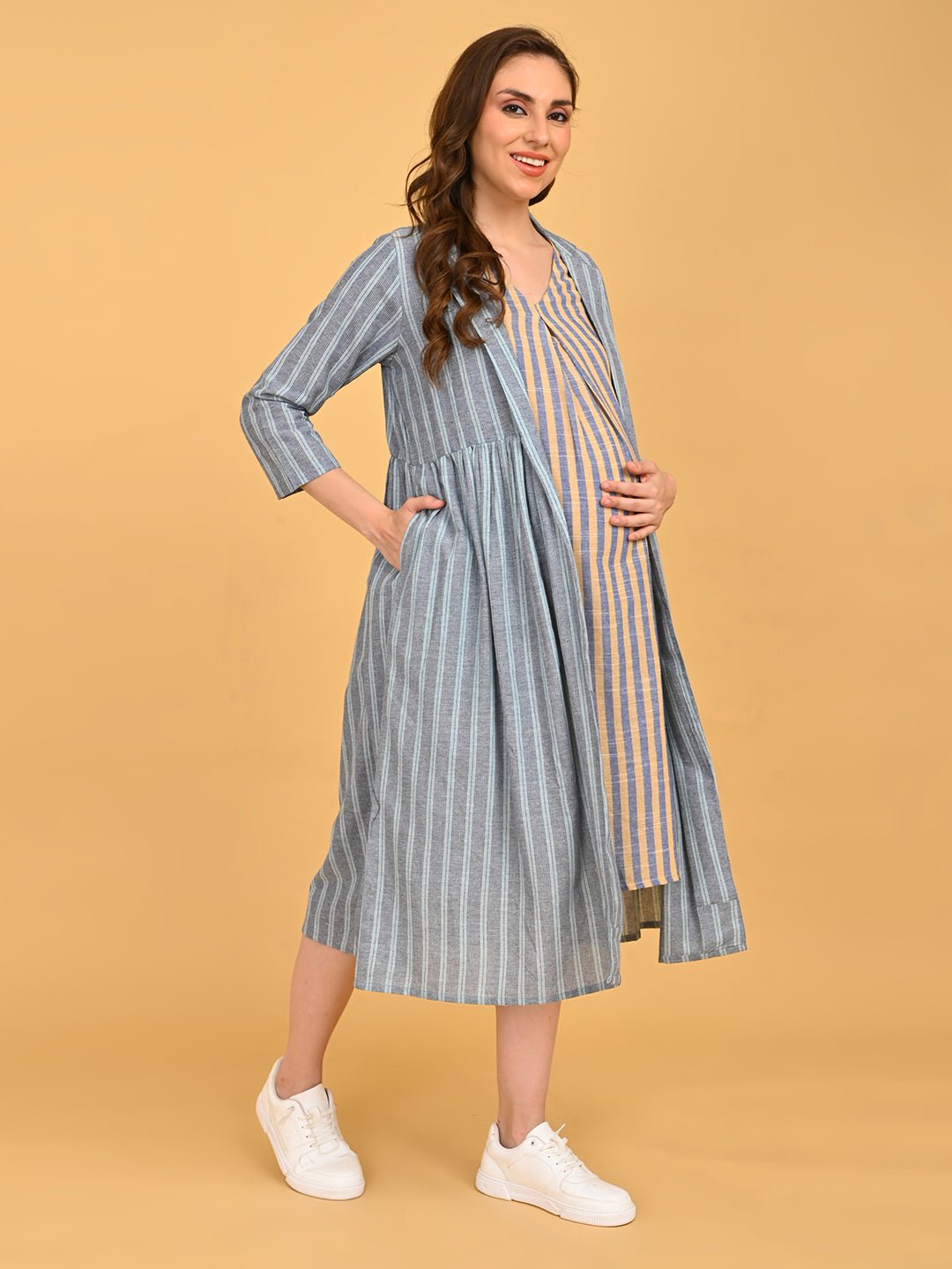 Modern Loom Maternity and Nursing Shacket Dress side pose of striped dress highlighting bump-friendly silhouette.