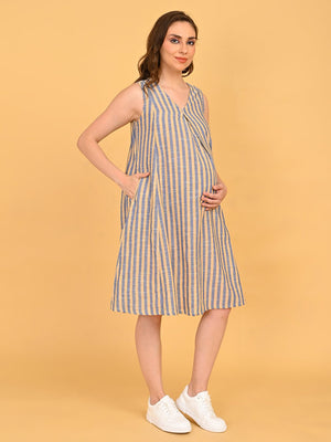 Modern Loom Maternity and Nursing Shacket Dress side pose of sleeveless striped dress highlighting bump-friendly silhouette.