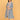 Modern Loom Maternity and Nursing Shacket Dress full-length front view of model wearing striped maternity dress with open shacket and white sneakers.