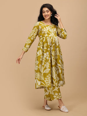 Model wearing mustard floral maternity and nursing kurta set styled for everyday comfort.