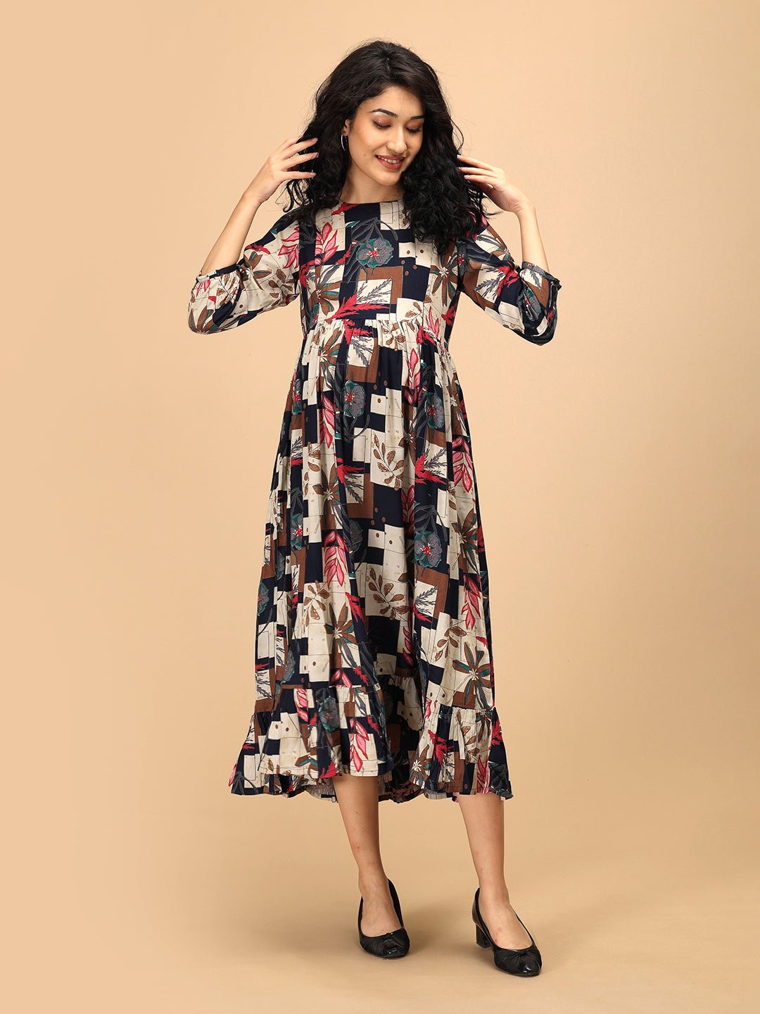 Front pose of The Mom Store Muted Muse maternity dress with pockets and multicolor patch-print.