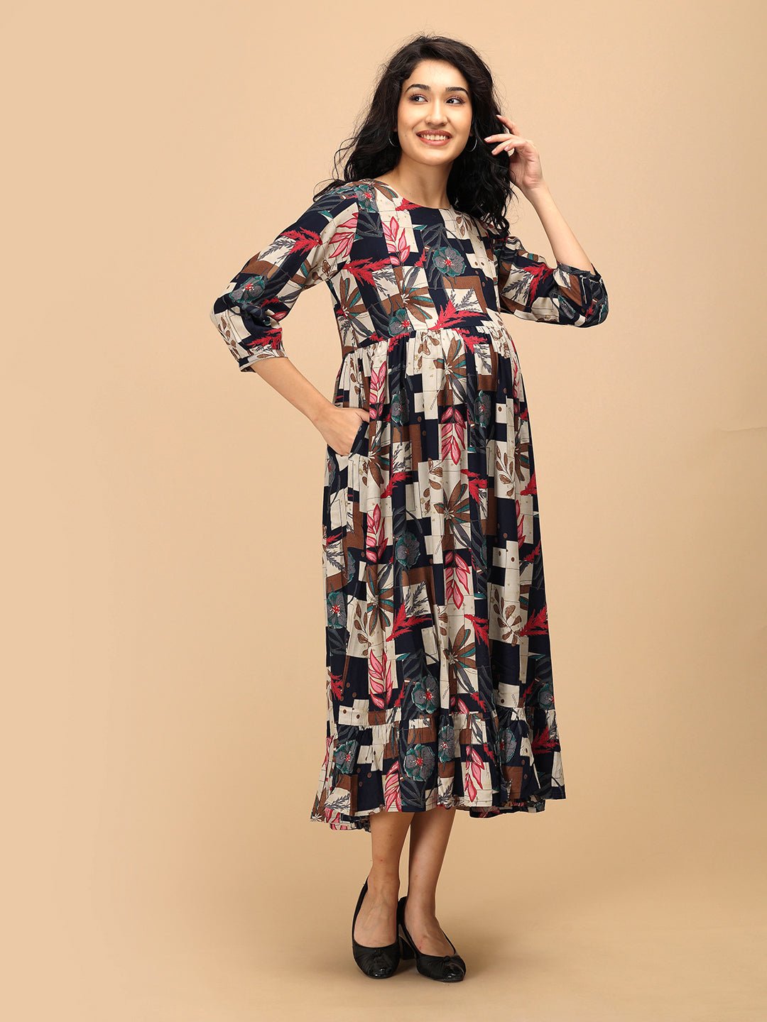 Front view of The Mom Store Muted Muse maternity and nursing dress with colorful patch-print blocks.