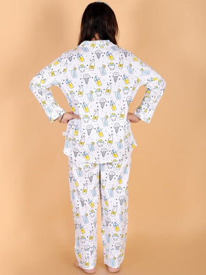 Playful pose by Model wearing my Smoothie Women's Pajama Set from the mom store facing her back