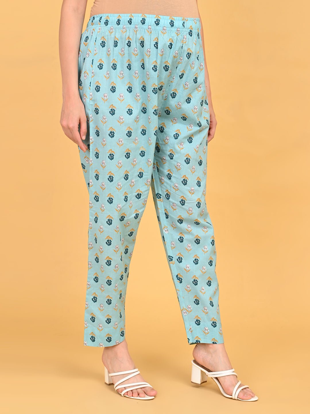 Blue printed maternity straight pants with elasticated waistband for pregnancy comfort.