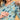 Close-up of hidden vertical nursing zipper on blue printed maternity kurta for easy breastfeeding access.