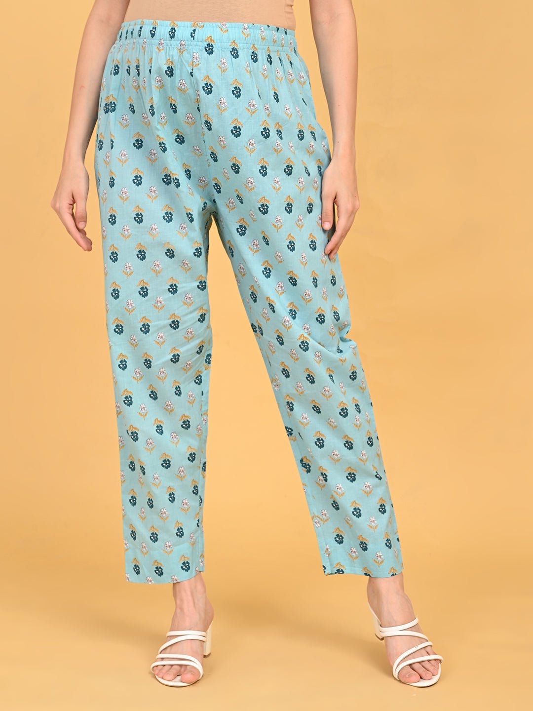 Blue printed maternity straight pants with elasticated waistband for pregnancy comfort.