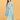 Model wearing Neelam Saaz blue floral maternity and nursing kurta set with straight pants.