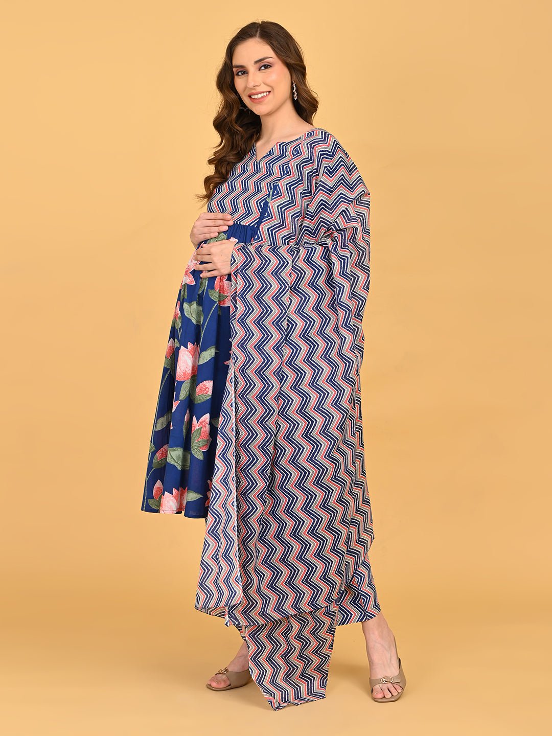 Angled pose of NeelVaani Maternity and Nursing Kurta highlighting functional side pockets and soft flare silhouette.
