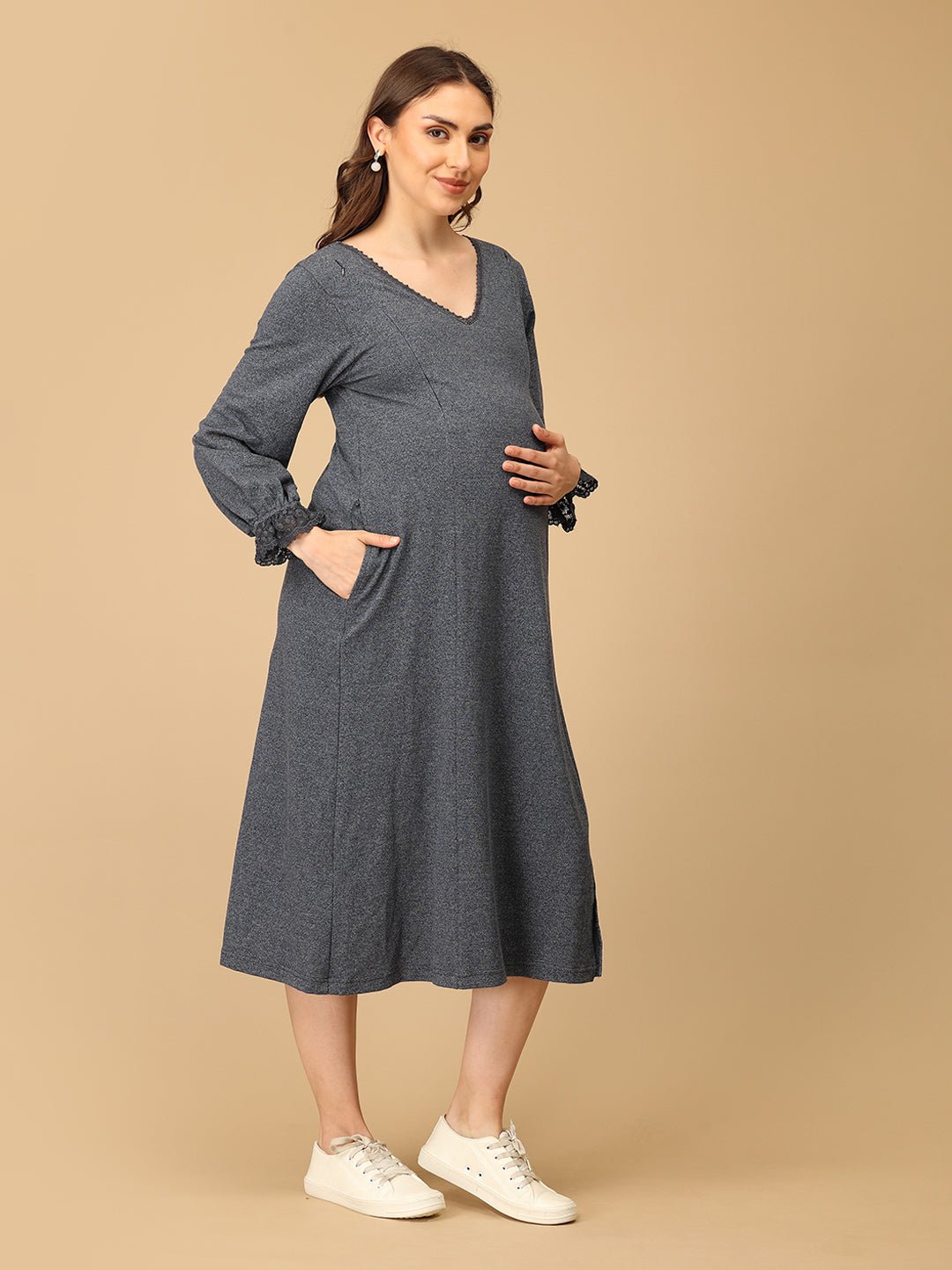 The Mom Store maternity winter dress featuring lace sleeve cuffs and side pockets for everyday comfort.