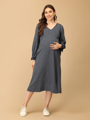 The Mom Store Night Shadow maternity sweater dress for stylish and warm winter wear during pregnancy.