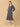 The Mom Store maternity winter dress with V-neck, side slit, and full sleeves for stylish pregnancy wear.