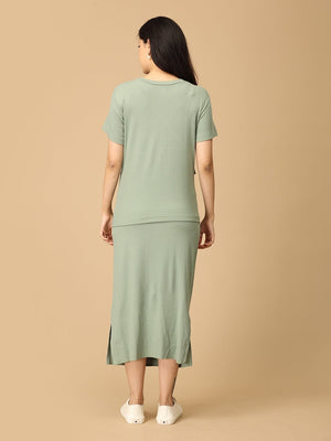 Model posing back wearing olive the trend ribbed maternity and nursing Co-ord set from the mom store