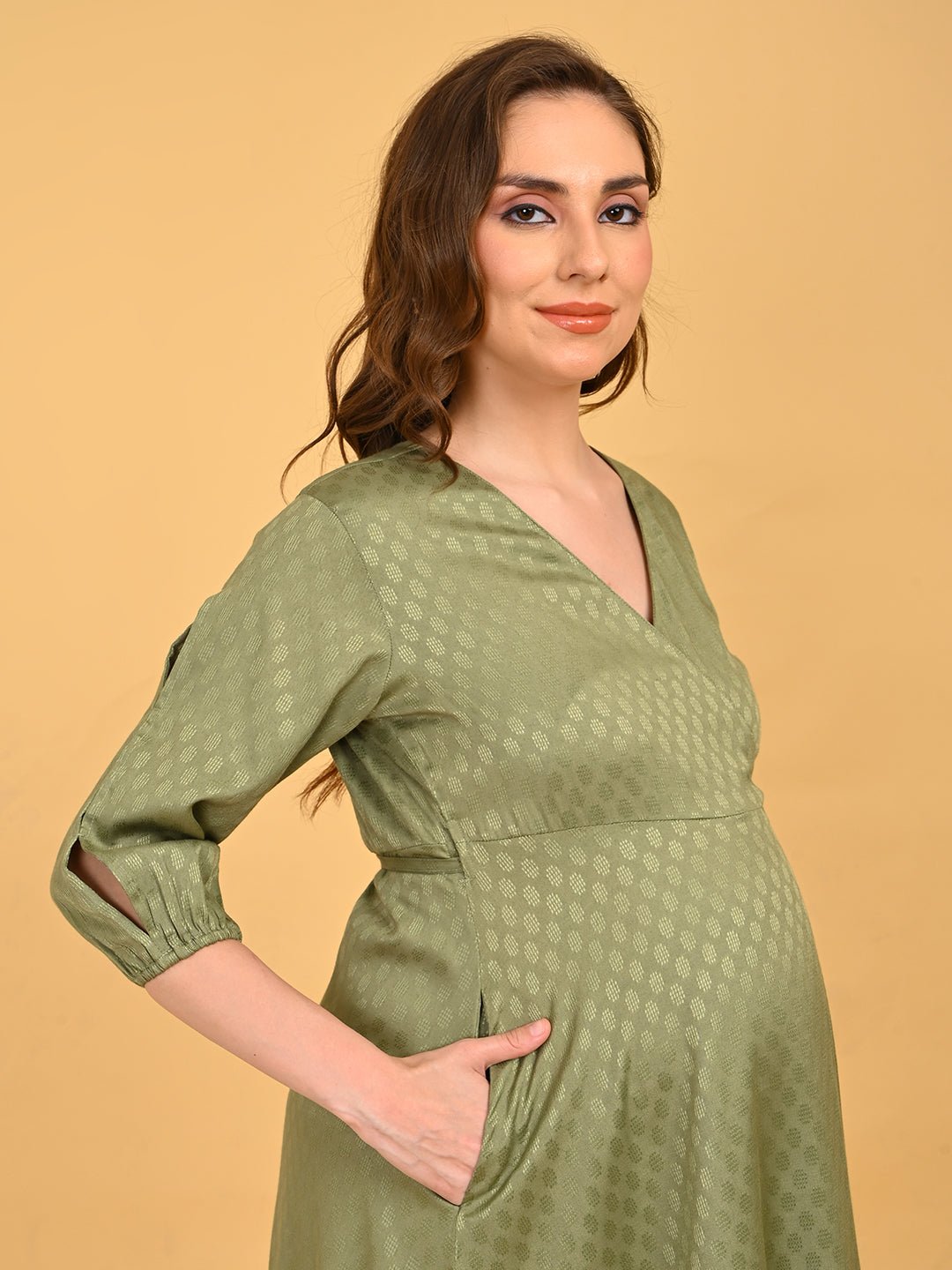 Olivious Maternity Wrap Dress angled side profile highlighting bump-friendly fit and soft drape.