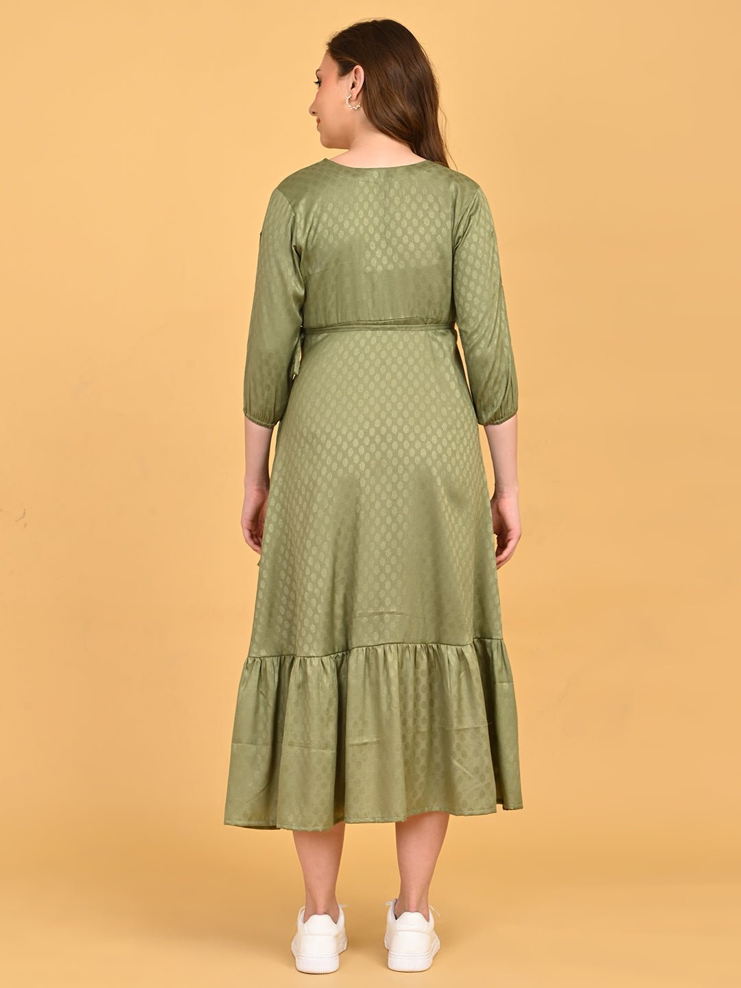 Olivious Maternity Wrap Dress back view showing relaxed fit, waist tie at back, and midi-length ruffle hem.