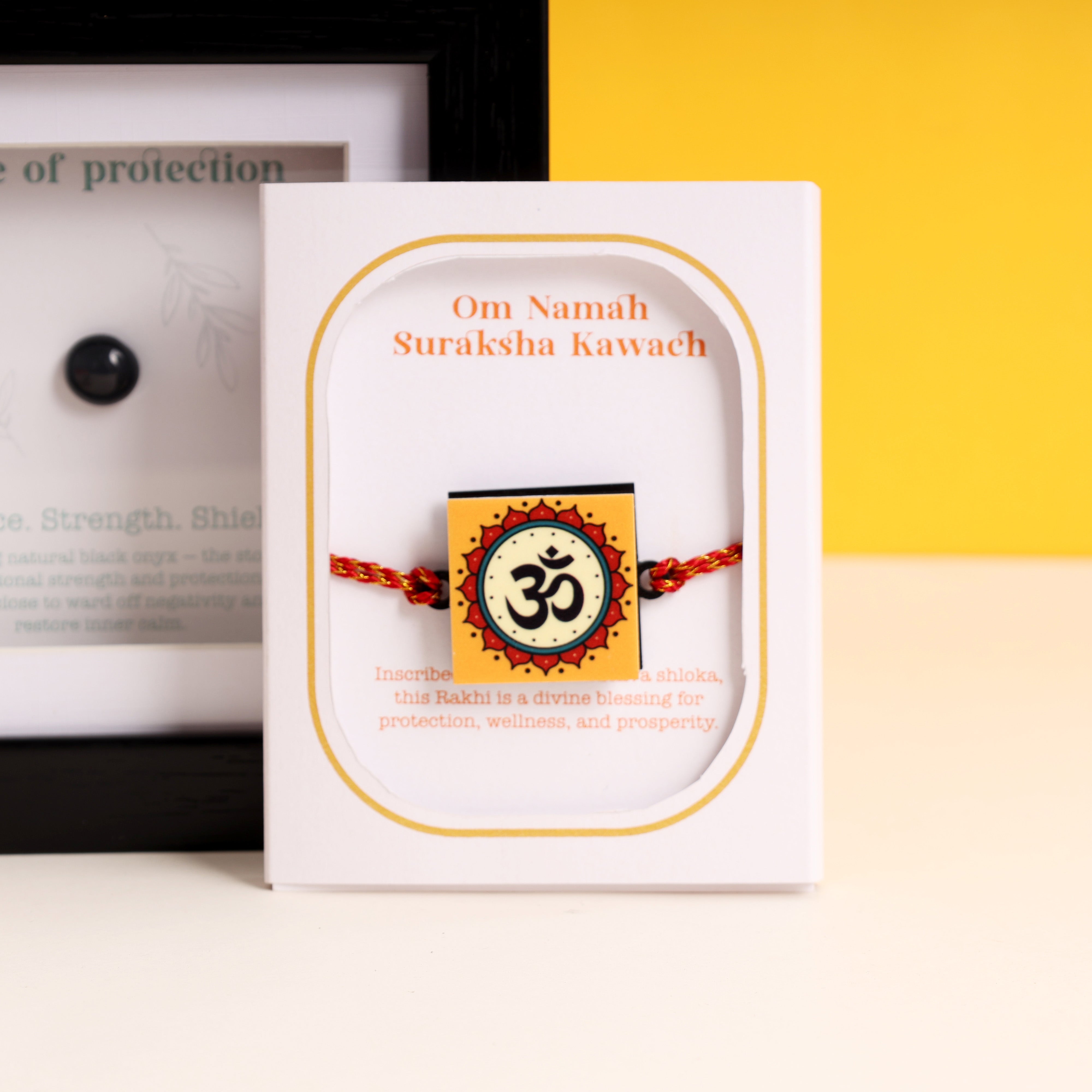 Oye Happy Evil Eye Rakhi Hamper – Om Rakhi, Negativity Shield Frame, Spiritual Candle & Charm | Rakhi Gift for Brother, Bhai & Bhaiya - OHEERH