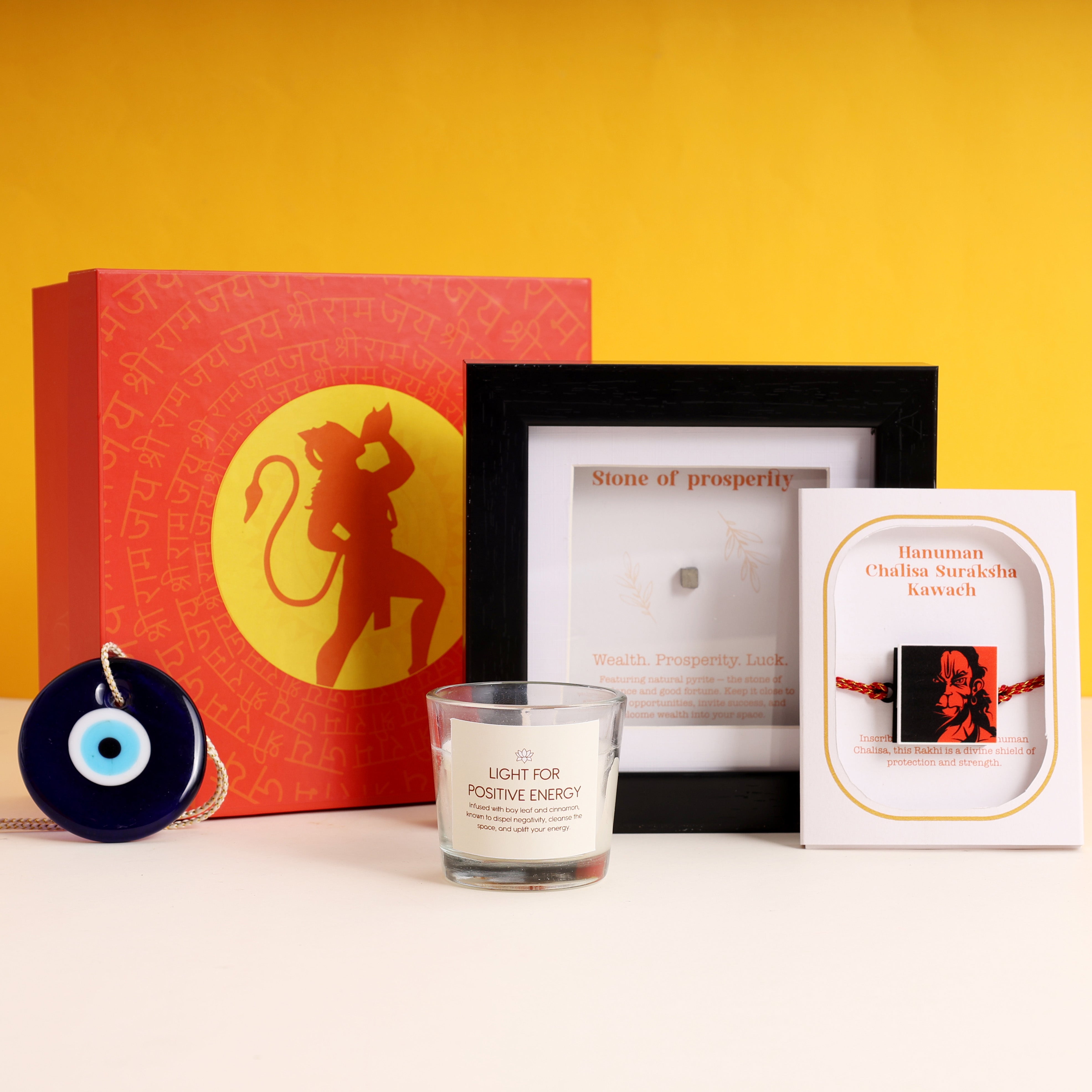 Oye Happy Hanuman Chalisa Rakhi Hamper – Rakhi, Wealth Gemstone Frame, Evil Eye Charm & Spiritual Candle | Rakhi Gift for Brother, Bhai & Bhaiya - OHHCRH