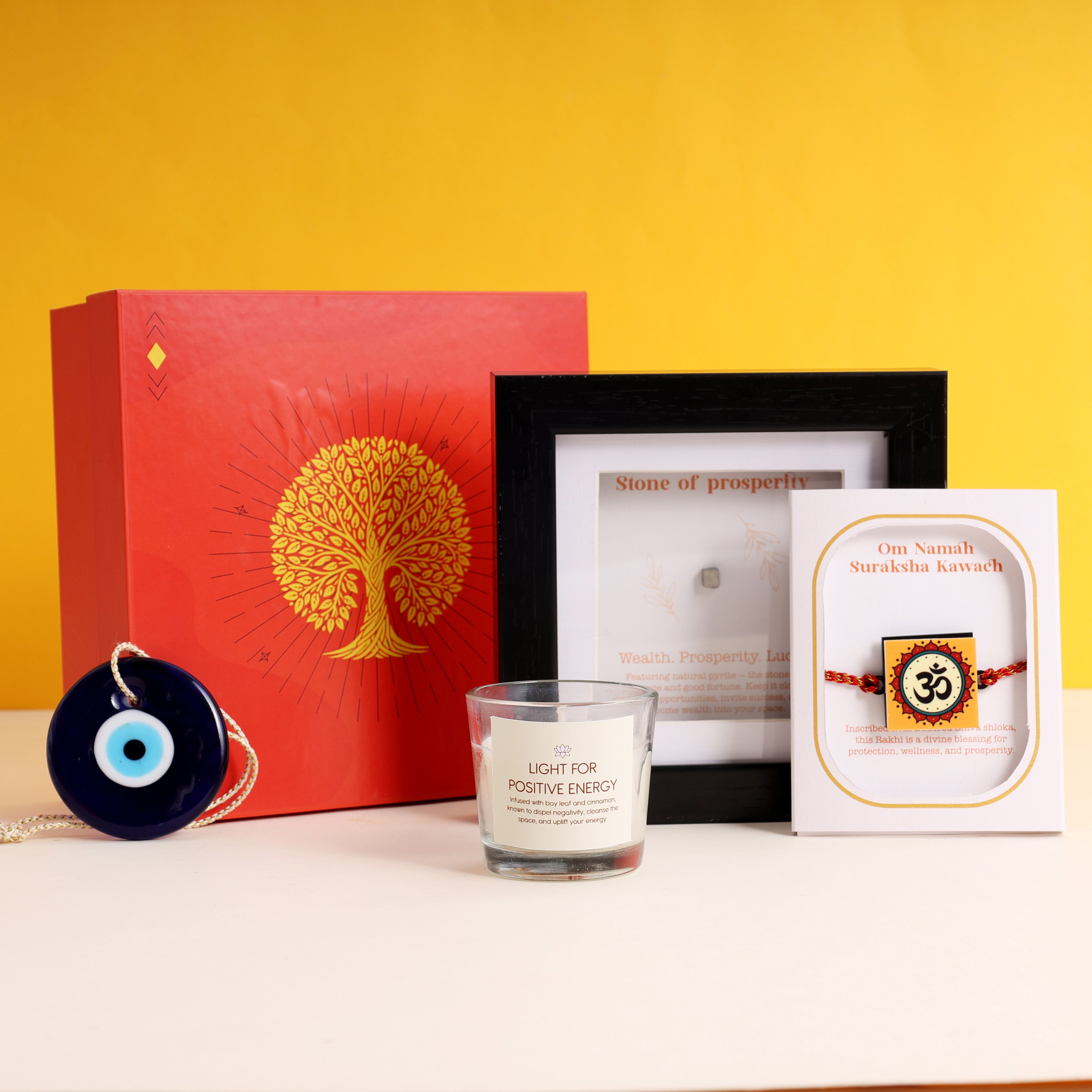 Oye Happy Wealth & Prosperity Rakhi Hamper - Gift Set with Rakhi, Charm, Candle & Frame | Rakhi Gift for Brother, Bhai & Bhaiya - OHWPH