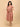 Peach Mirage Maternity and Nursing Dress ‚Äì front view of overlap neckline dress with short sleeves and midi length.