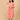 Model wearing a peach printed maternity and nursing dress layered with a matching open-front shacket, standing against a beige background.