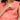 Close-up of discreet nursing zipper on peach maternity dress for easy breastfeeding access.