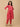 Side angle of the printed pink maternity pants showing the relaxed straight silhouette and comfortable fit.
