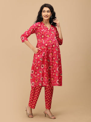 Side angle of the printed pink maternity pants showing the relaxed straight silhouette and comfortable fit.