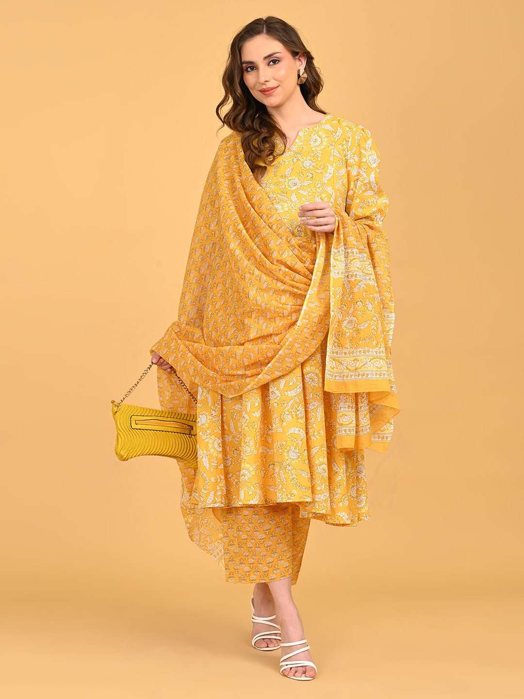Model wearing Phoolon Ka Noor yellow maternity and nursing kurta set with dupatta and straight pants.