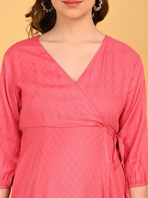 Pink to the Future Maternity Wrap Dress close-up of V-neck wrap bodice with subtle textured fabric and side tie detail.