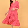 Pink to the Future Maternity Wrap Dress front view with hands on bump and pockets, showcasing soft textured finish and midi length.