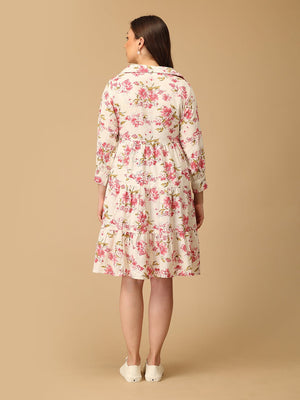 Woman wearing a floral dress against a beige background