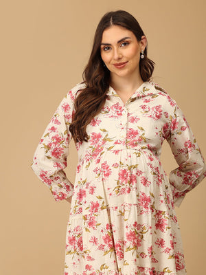 Woman wearing a floral dress against a beige background