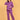 Pregnant model wearing Purple Frostbite maternity and nursing hoodie with matching lounge pants, gently holding baby bump.