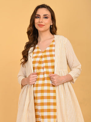 Quiet Grid Maternity and Nursing Shacket Dress front portrait of model wearing striped shacket over yellow check maternity dress.