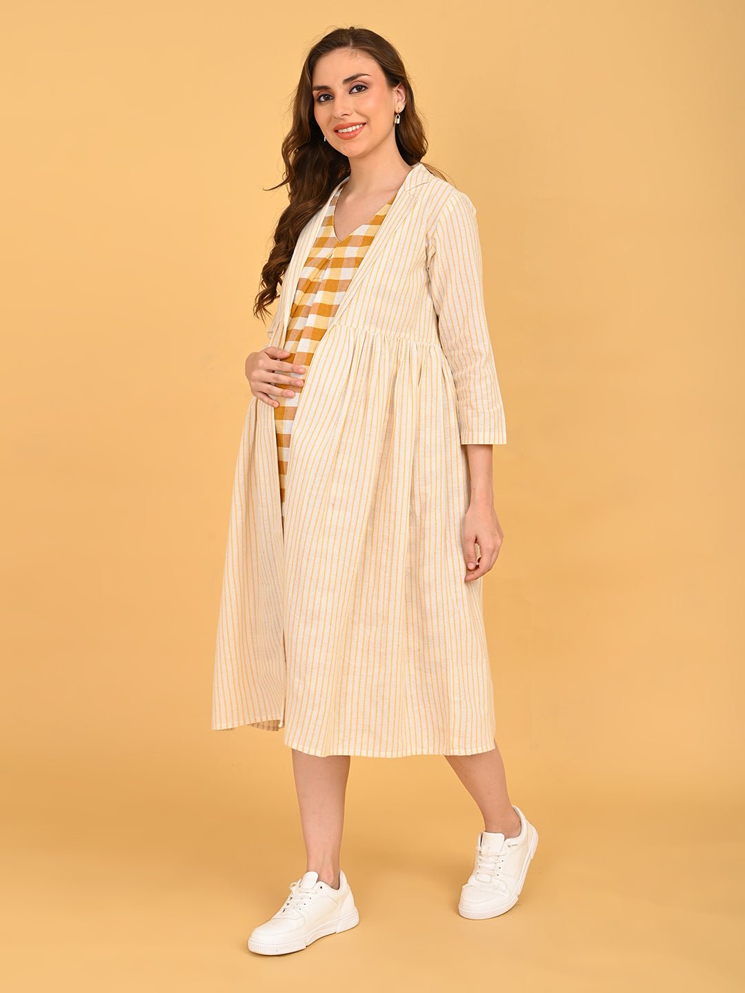 Quiet Grid Maternity and Nursing Shacket Dress side pose with model wearing striped shacket layered over check maternity dress.
