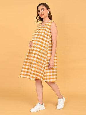 Quiet Grid Maternity and Nursing Shacket Dress side angle of model showcasing bump-friendly silhouette and gingham check pattern.