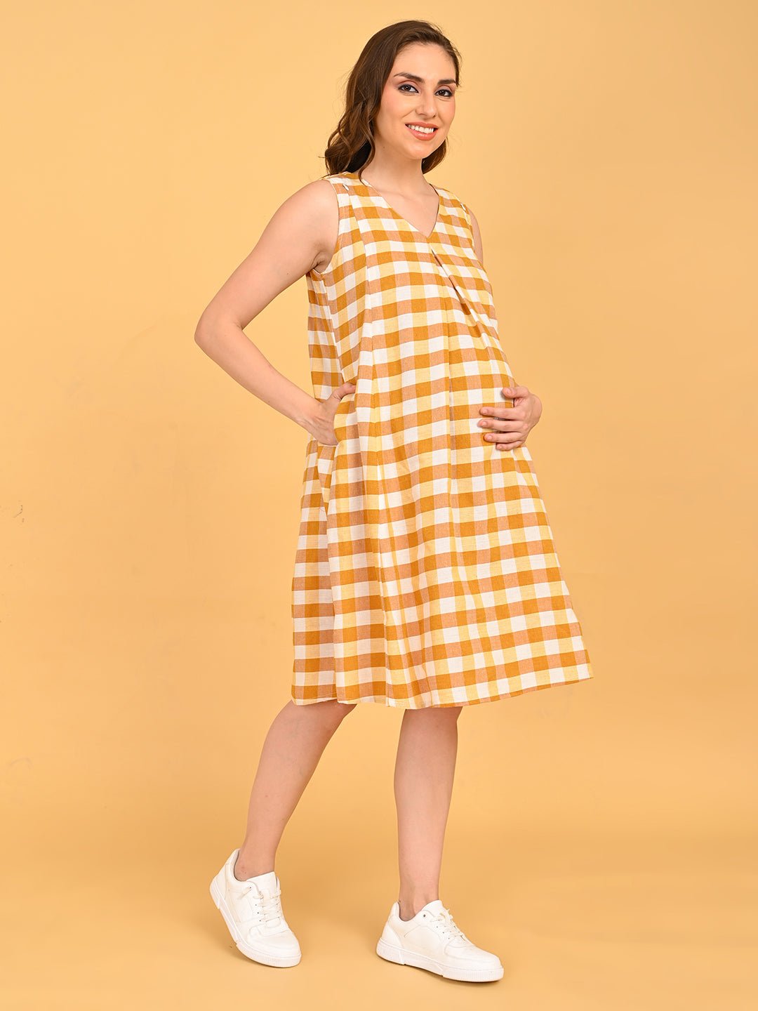 Quiet Grid Maternity and Nursing Shacket Dress front pose with hand on hip highlighting relaxed maternity fit.