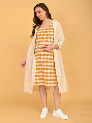 Quiet Grid Maternity and Nursing Shacket Dress walking pose highlighting layered maternity dress and striped shacket.