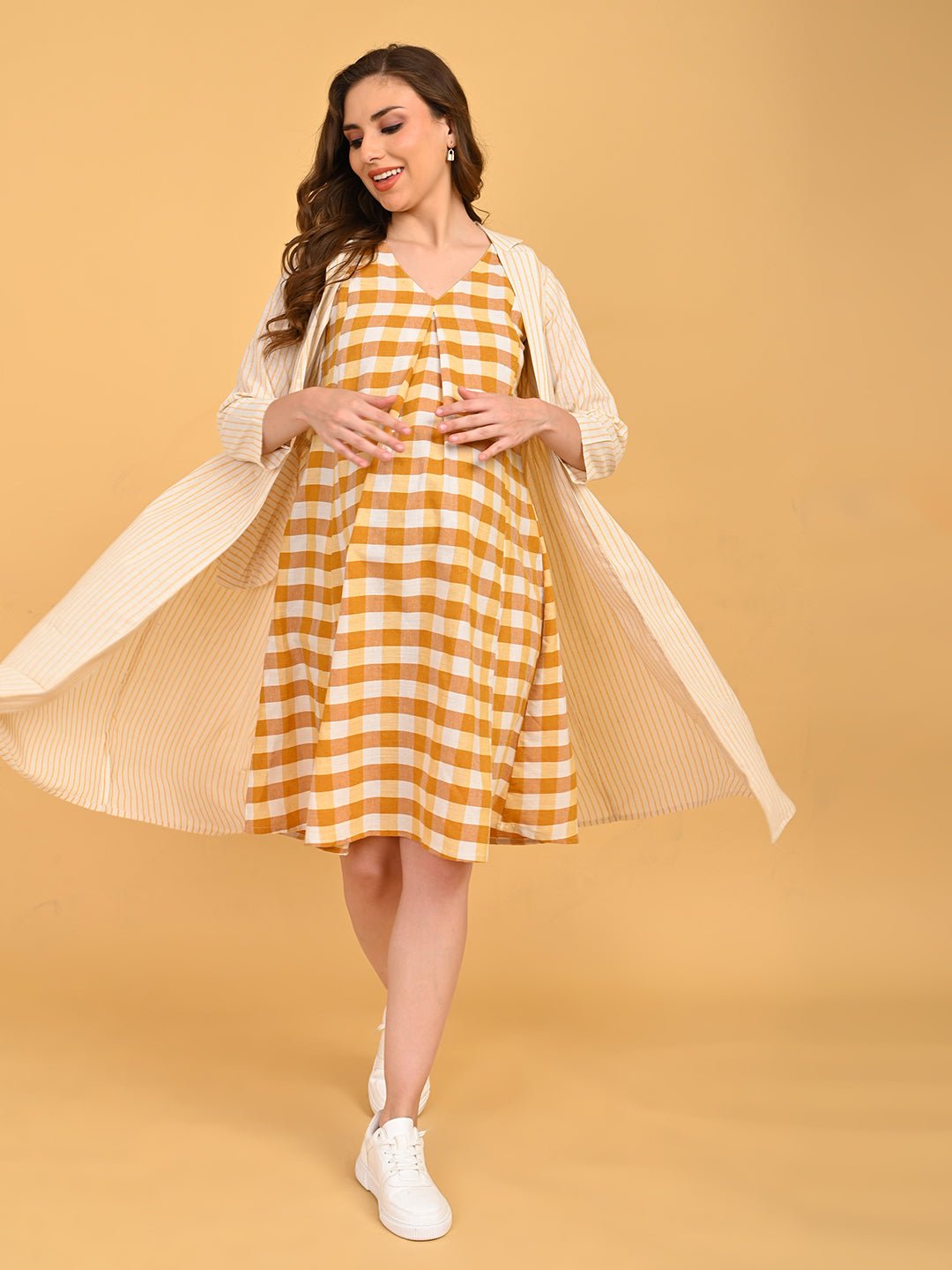 Quiet Grid Maternity and Nursing Shacket Dress dynamic pose with shacket flowing open over check maternity dress.