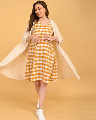 Quiet Grid Maternity and Nursing Shacket Dress dynamic pose with shacket flowing open over check maternity dress.