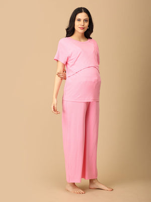 pregnant model wearing Ros√© All Day Maternity and Nursing Nightwear Set from the mom store, with her hands tied back