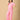 Playful pose by pregnant model wearing Ros√© All Day Maternity and Nursing Nightwear Set from the mom store, touching her face
