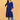 Pregnant model styling royal blue maternity kurta with light blue pants, white sneakers, and beige clutch.