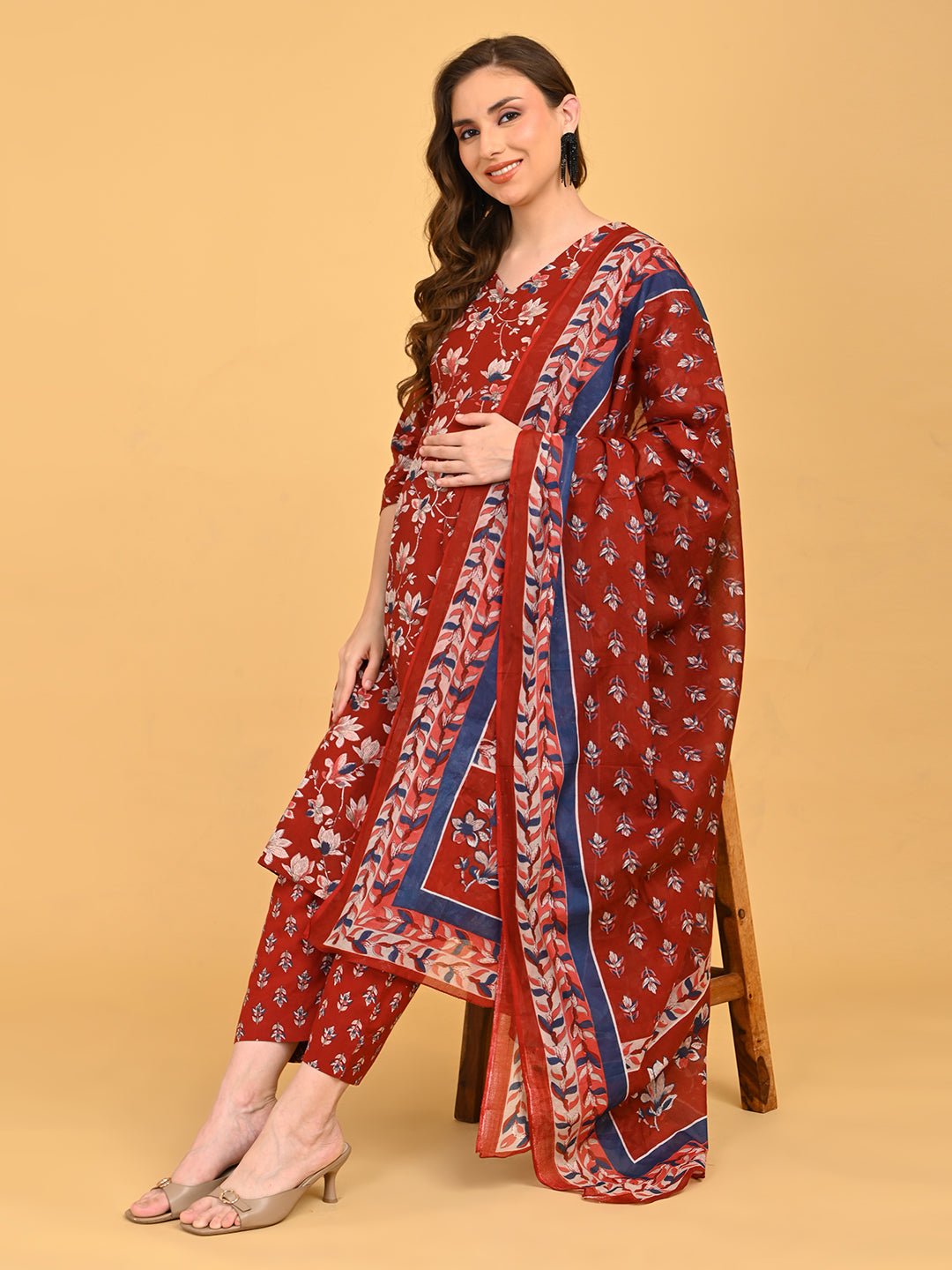 Ruhani Maroon Maternity and Nursing Kurta Set With Dupatta styled with matching printed dupatta in seated pose.