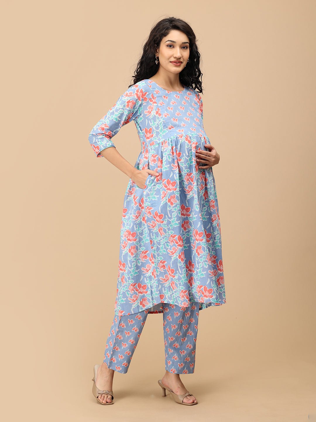Side view of blue floral Saanjh Phool maternity kurta with empire waist – comfortable pregnancy wear.