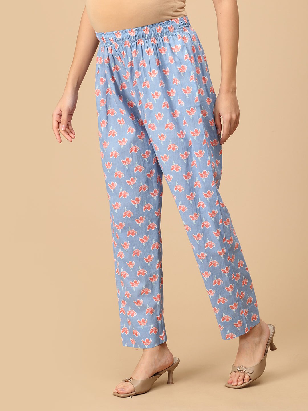 Side view of blue floral maternity pants – soft cotton elastic waist trousers for pregnancy.